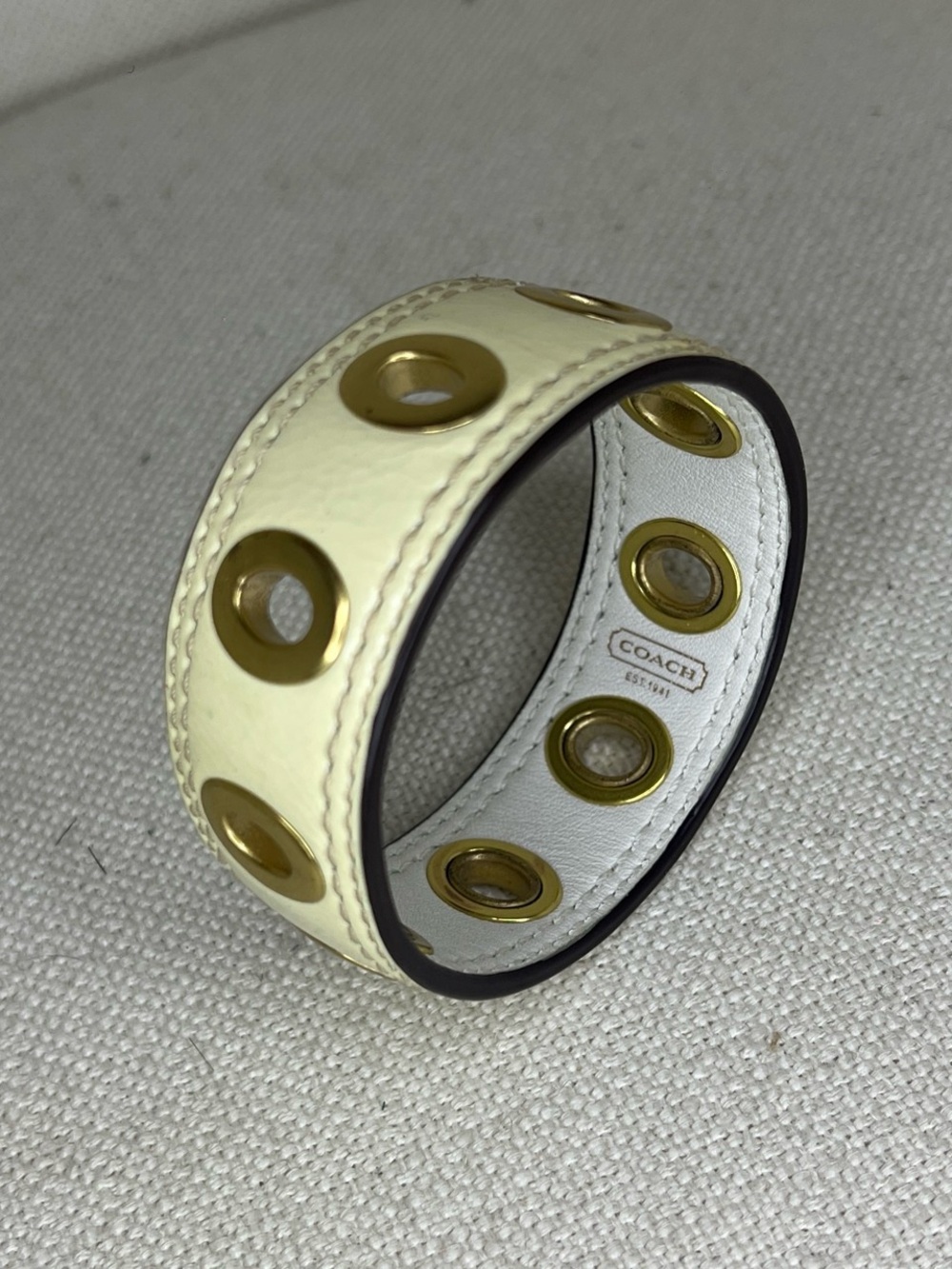 COACH Pale Yellow Leather Grommet Cuff Bracelet with Gold-Tone Hardware